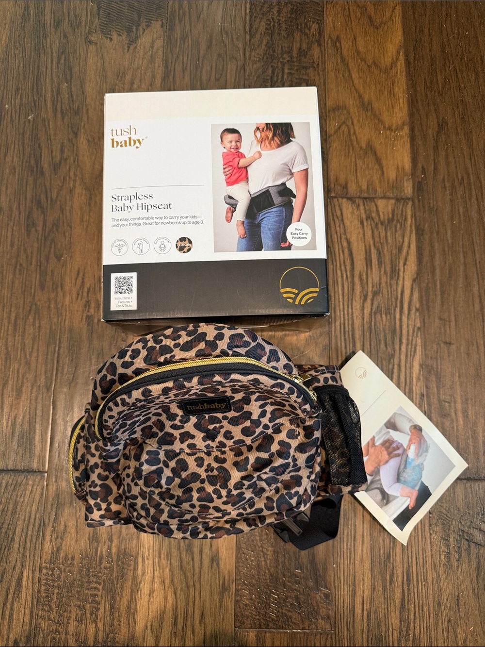 NEW (never used) TushBaby Hip Carrier in Leopard Print